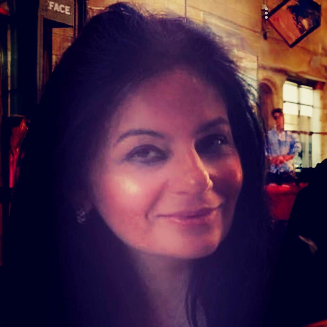 Dr Harinder Magon